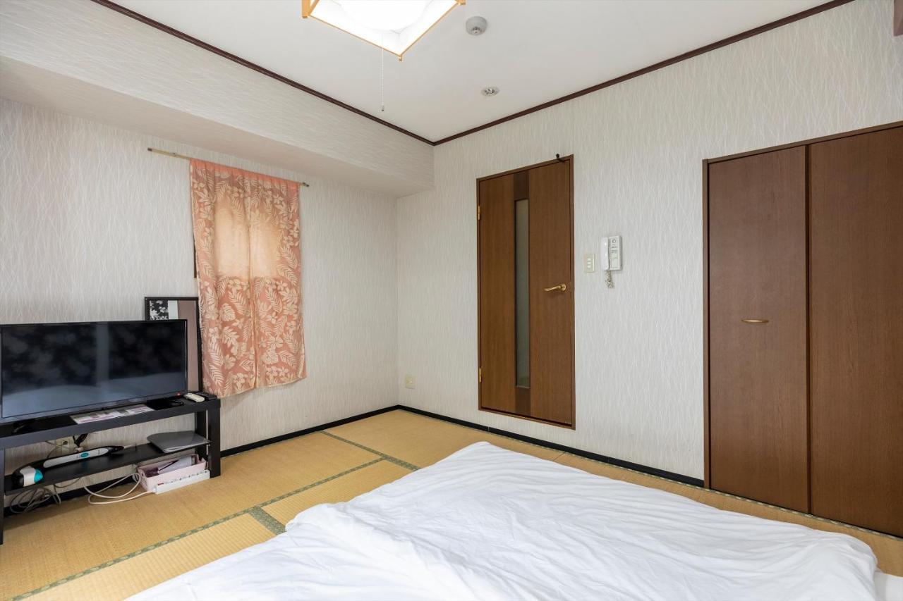 Ryokan Sinsekai - Tourpalace Осака Экстерьер фото